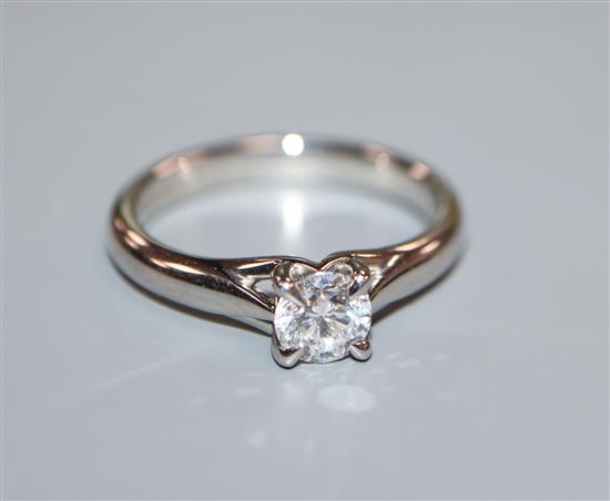 A Mappin & Webb platinum set solitaire diamond ring, size L, with original elaborate Mappin & Webb packaging,